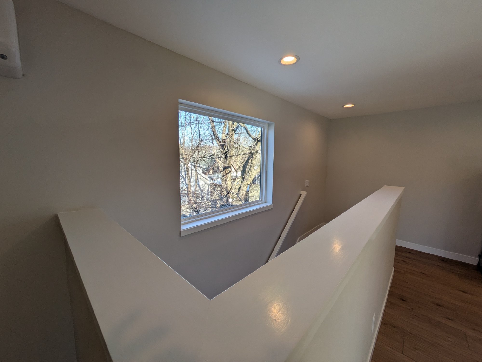 Finished ADU bathroom with walk-in shower, vanity and window — Madison WI