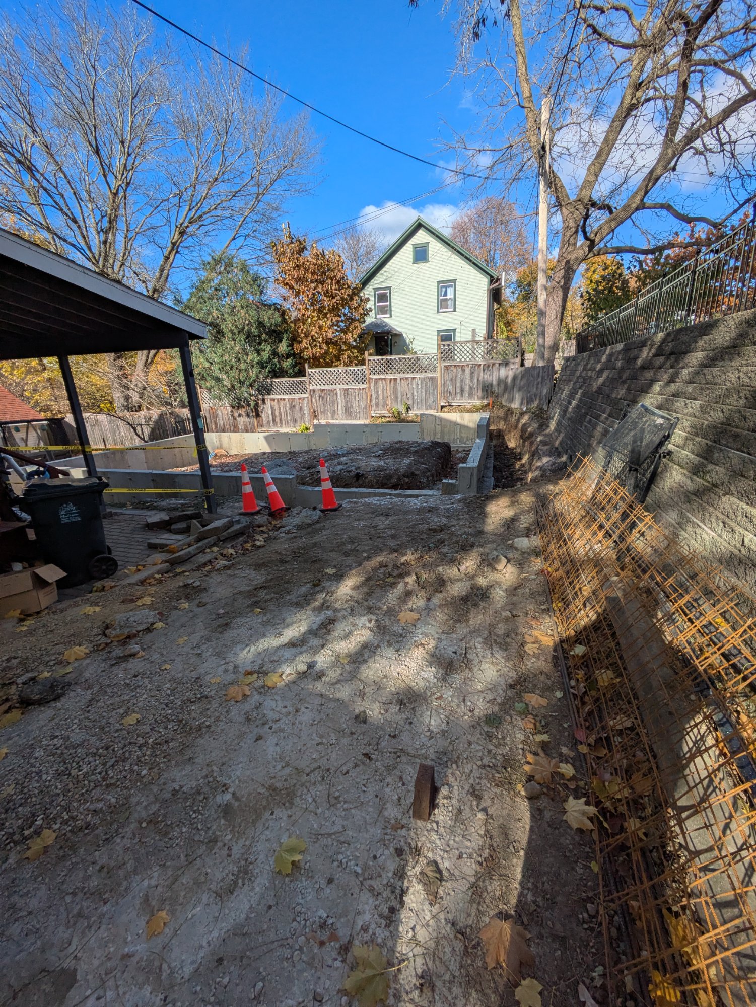 Site excavation with retaining wall rebar in place — Henry Vilas ADU, Madison WI